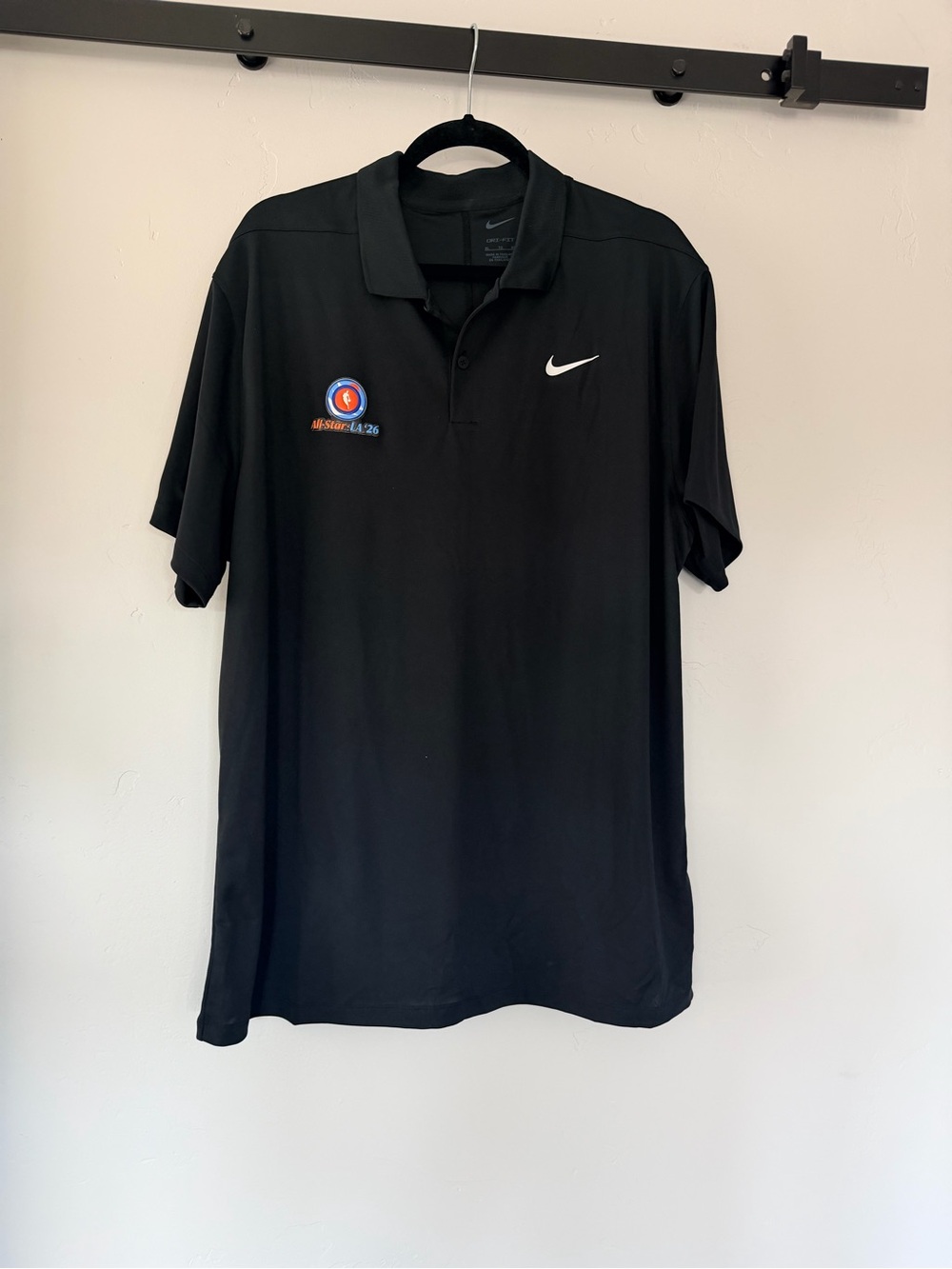 Nike NBA 2026 All Star Men’s Black Polo with White Swoosh and Multicolor Patch